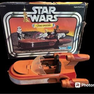 StarWars Vintage Collectible 1977 Land Speeder + action figures shown.